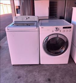White Kenmore Washer And LG Electric Dryer