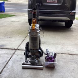 Dyson vacuum cleaner works perfect excellent condition never new section. All the attachment is include.