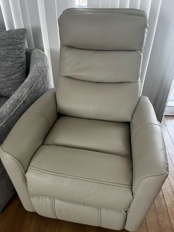 Cream leatherette recliner