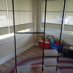 Rolling wardrobe rack w/shelves