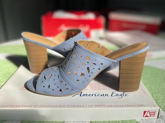 Light Blue Stacked Heel Mules. Size 12. $30.