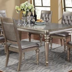Dining table and chairs, adjustable length