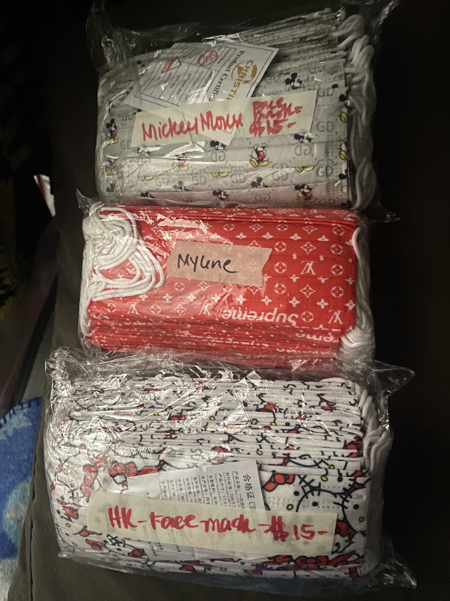 Disposable Face Mask with 3 designs Hello Kitty,Mickey Mouse and red LV $15 each pack.