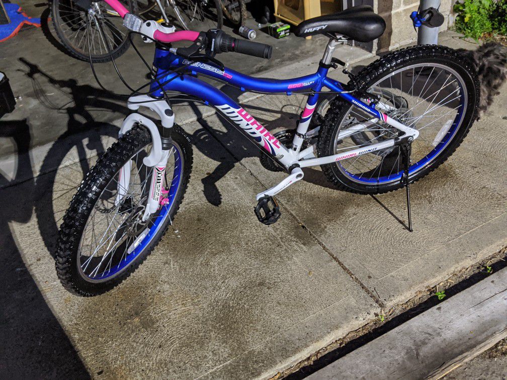 Like new,use a few times,24" women Genesis 24 whirl wind,disk brake,front shocks only $220