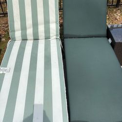 Cushions And Tan Chairs 