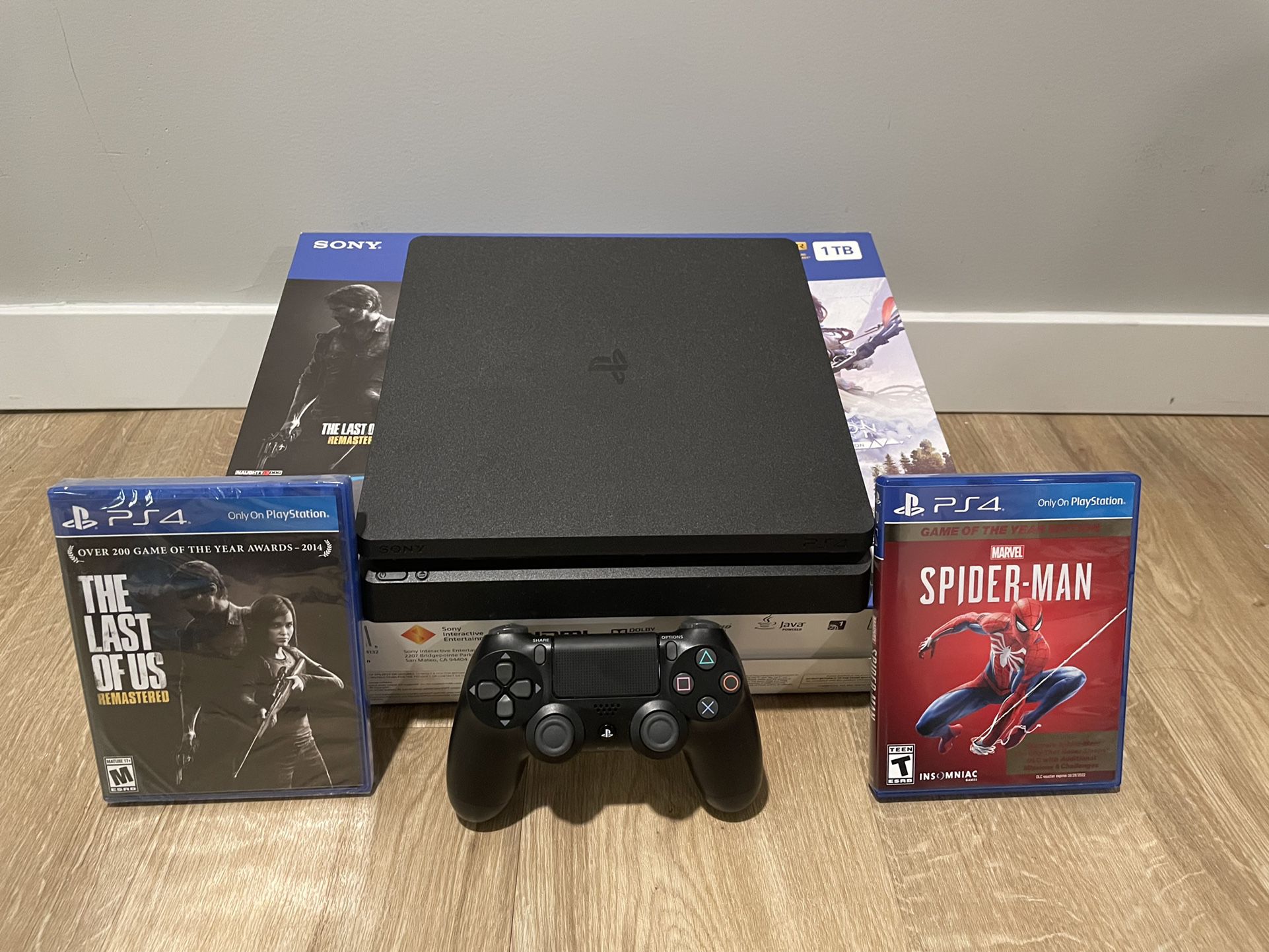 PlayStation 4 Slim 1TB + Controller Spiderman + The Last Of Us. PS4 Slim 1TB for Sale in Seattle, WA - OfferUp