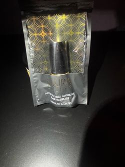 Laura Geller retractable, airbrush, kabuki brush