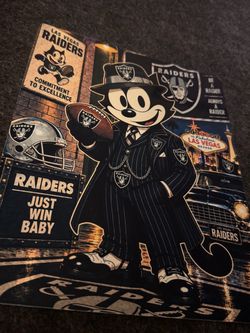 Raiders Felix the cat on a metal sheet