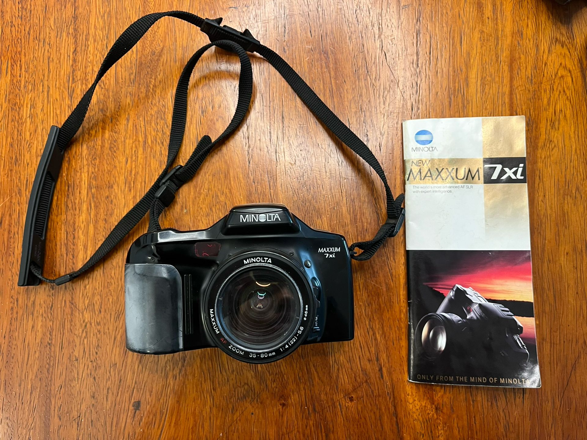 Minolta Maxxum 7xi 35mm Film Camera – With Strap & Manual
