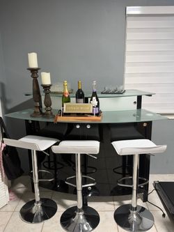 Black Home Bar with 3 White Bar Stools