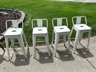 Set of 4 metal high boy chairs
