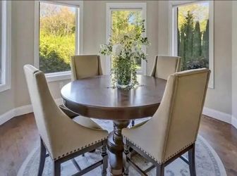 Round Pedestal Dining Table and 4 Upholstered Chairs