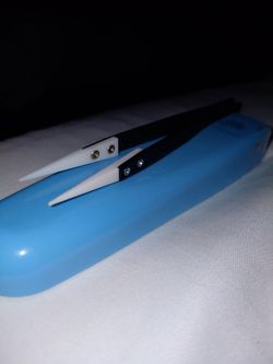 Precision tweezers with a ceramic tip
