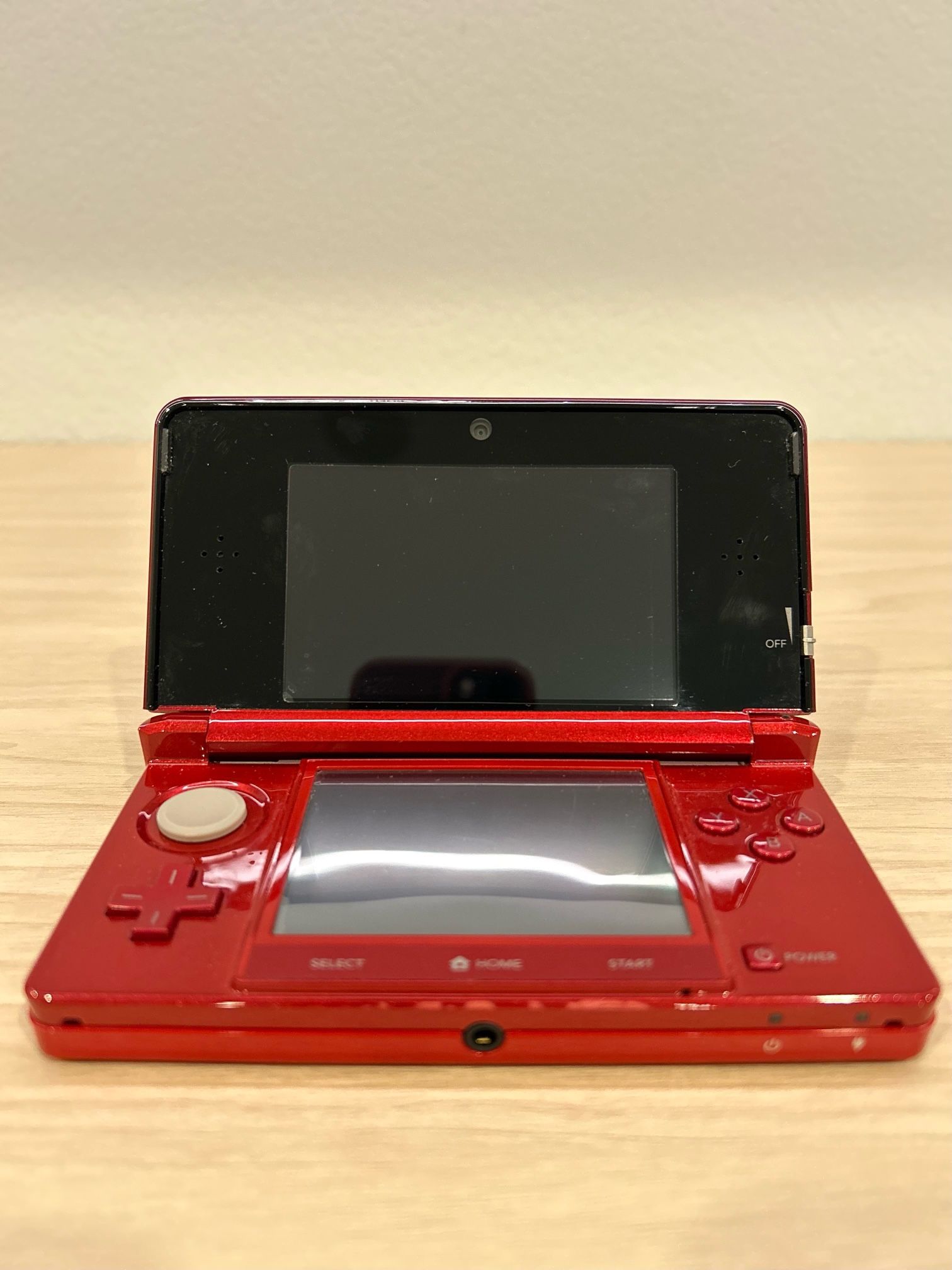 Red Nintendo 3DS with Stylus, Charger And 2 Games
