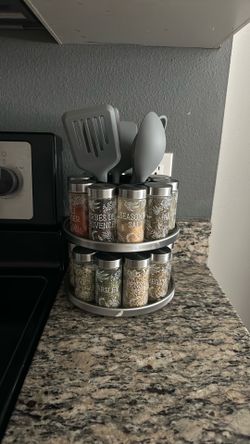Spice rack with labeled jars