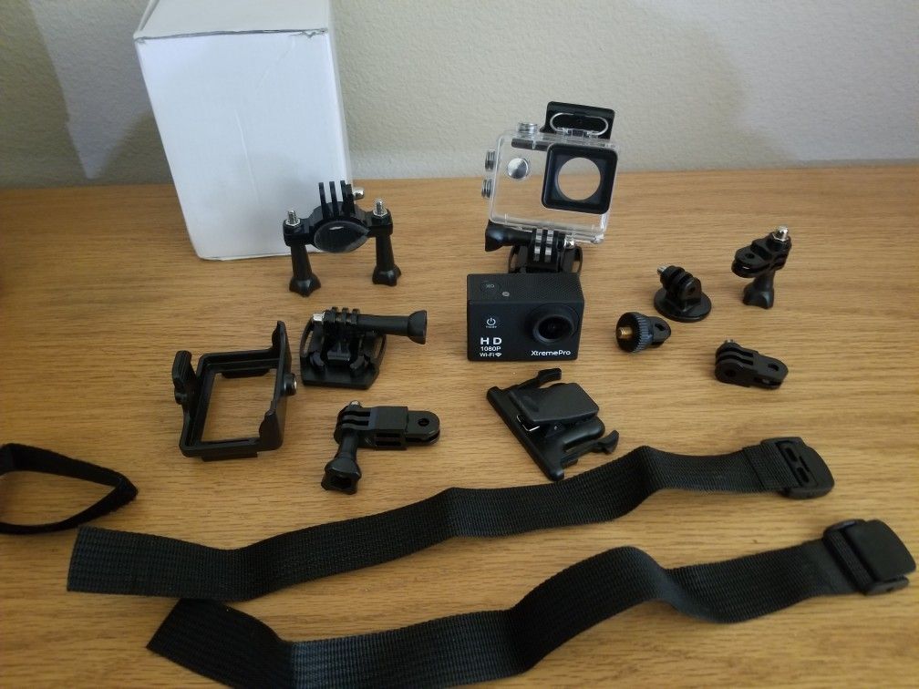 Mini camera with mounting system and wear proof case