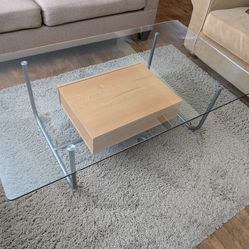 Glass coffee table with storage