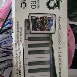 Rock band 3 for the WII (WITH KEYBOARD AND GAME)