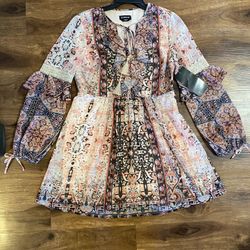 Brand new woman’s Bebe brand pink dress up for sale 