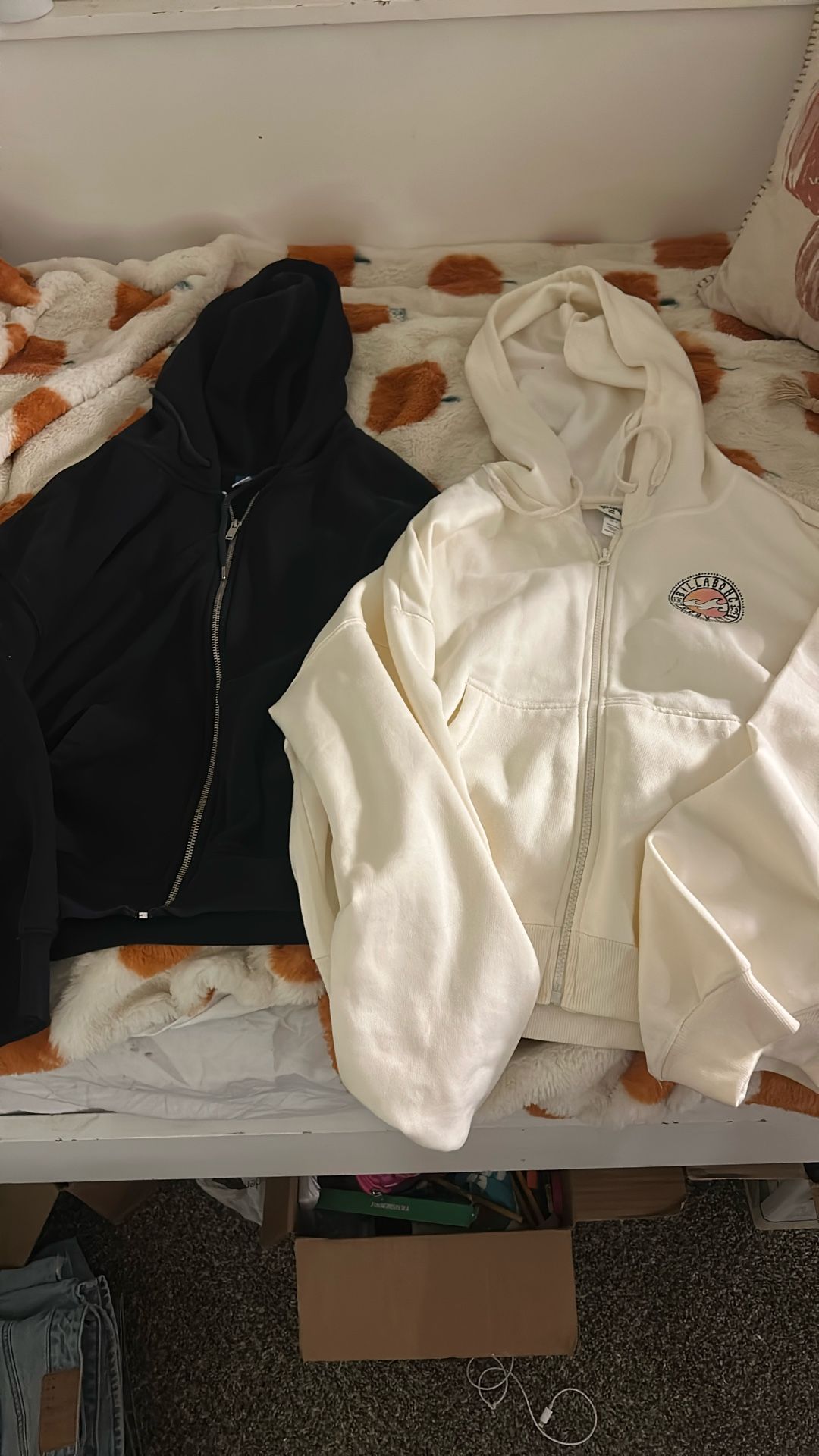 2 medium sized zip up hoodies