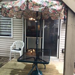 Sunbeam 32x54 Glass Patio Table with Floral Umbrella, Stand, and Heavy Base Green Nice Condition 
