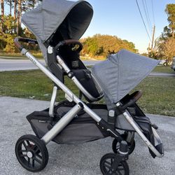 uppababy vista 2 double stroller in gregory with bassinet