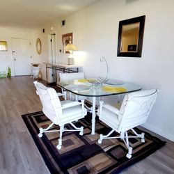 Table And Rolling Chairs 