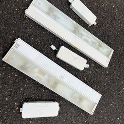 Two under cabin lights with wire boxe fixtures