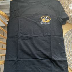 New Black Vans tee featuring a bold yellow graphic. 