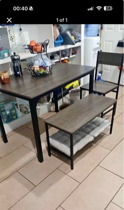 Small table with bench and one chair