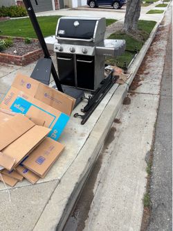 Moving boxes and 2 bed frames and bbq