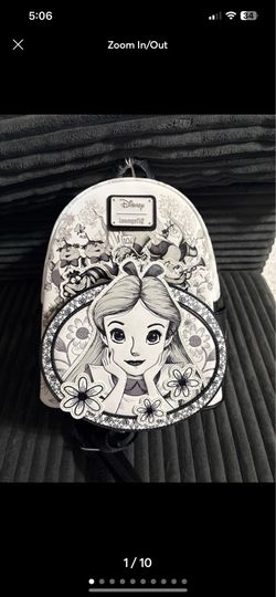 Alice in wonderland sketchbook and white rabbit Funko pop