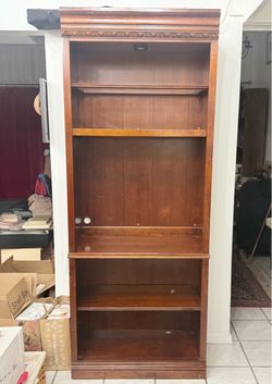Tall Wood Bookcase with Carved Crown Molding