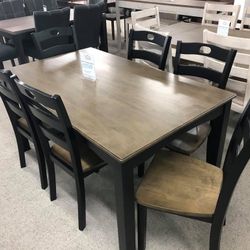Froshburg Grayish Brown /Black Dining table and Chairs (Set of 7)