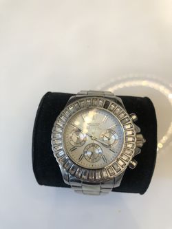 Invicta silver missing a small rock