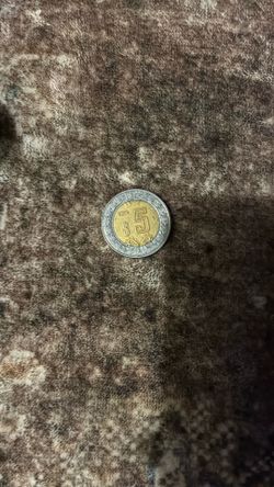 2004 peso five dollar coin