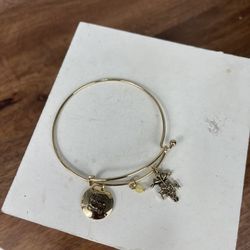 Goldtone Adjustable Bangle.