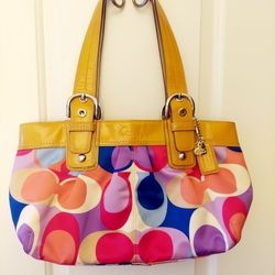 Colorful coach handbag in mint condition.