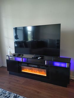 55' TV and fire place