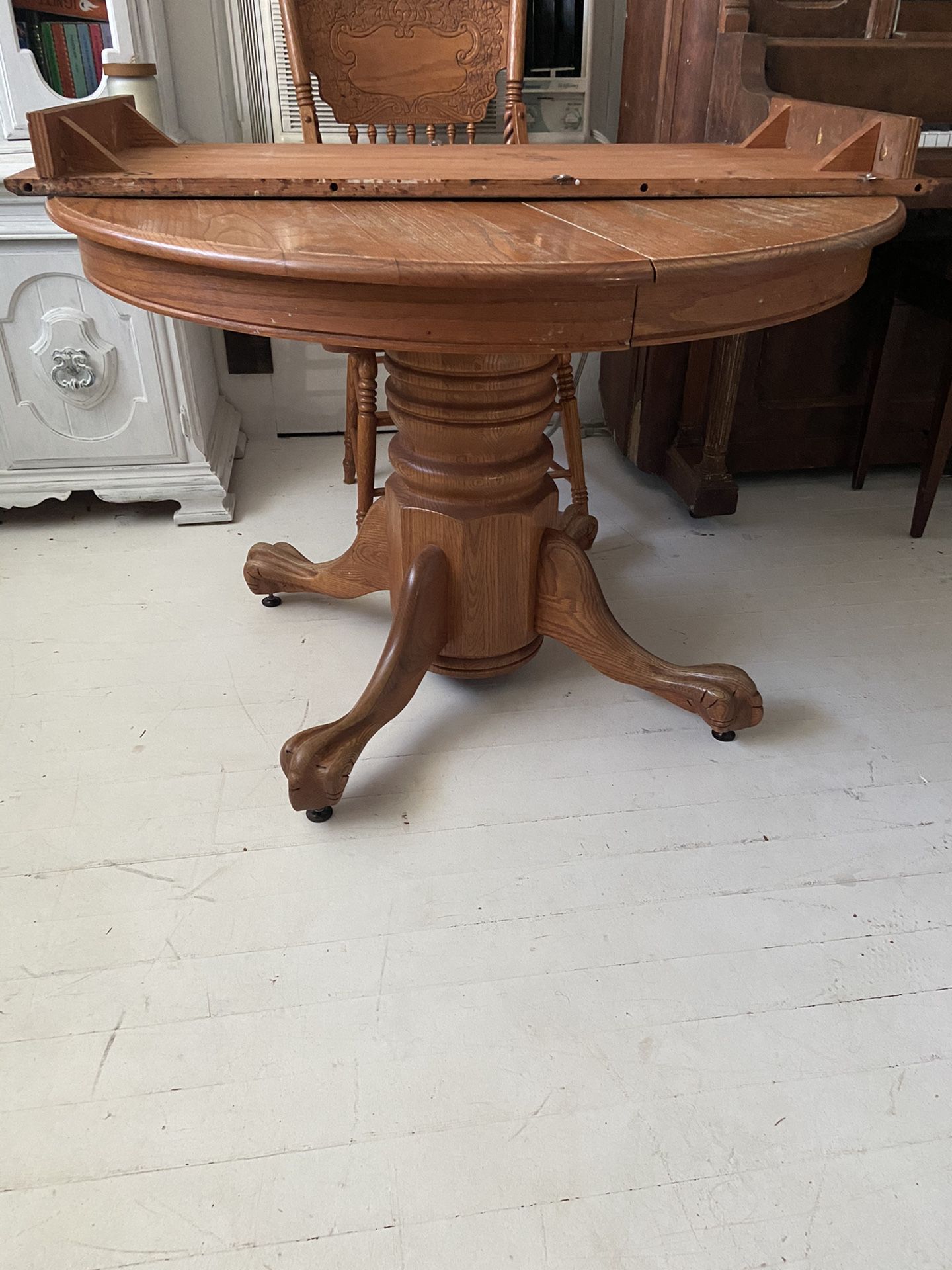 Vintage round table with leaf. Chair not included.