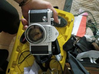 Older Film Camera With Accessories And Case 