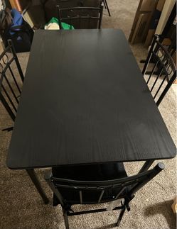 Dinning Table - 4 chairs with seating pads - Color Black