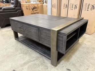 NEW! SIGNATURE DESIGN BY ASHLEY Forleeza Dark Gray Industrial Style Lift Top Cocktail Table with Painted Bronze Accents (Southcenter)