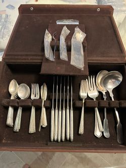 Silver plated Utensil Set In Case-$50.00