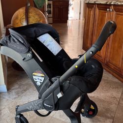 Doona Infant Car Seat & Stroller - Vashtie Limited Edition