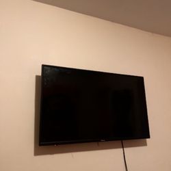 43” TOSHIBA Class C350 Series LED 4k UHD Smart Fire Flat screen TV with mount attached 