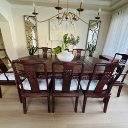Rosewood Japanese dining table with 8 chairs.
