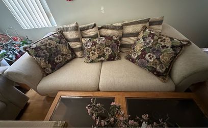 Cream Fabric Loveseat and sofa with Decorative Pillows