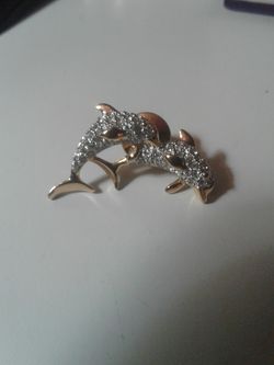 Gorgeous gold plated dolphin pin