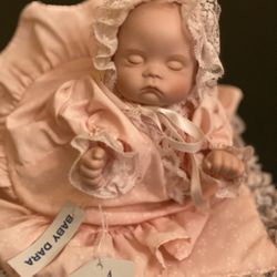 Precious Porcelain Music Box Doll